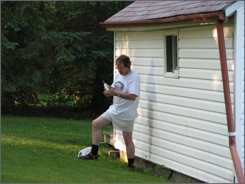 041 Jamie Fixing Cottage.jpg