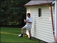 041 Jamie Fixing Cottage.jpg