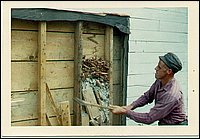 Stanley_Demolishing_Cottage.jpg