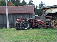 Tractor By Wood Pile.jpg